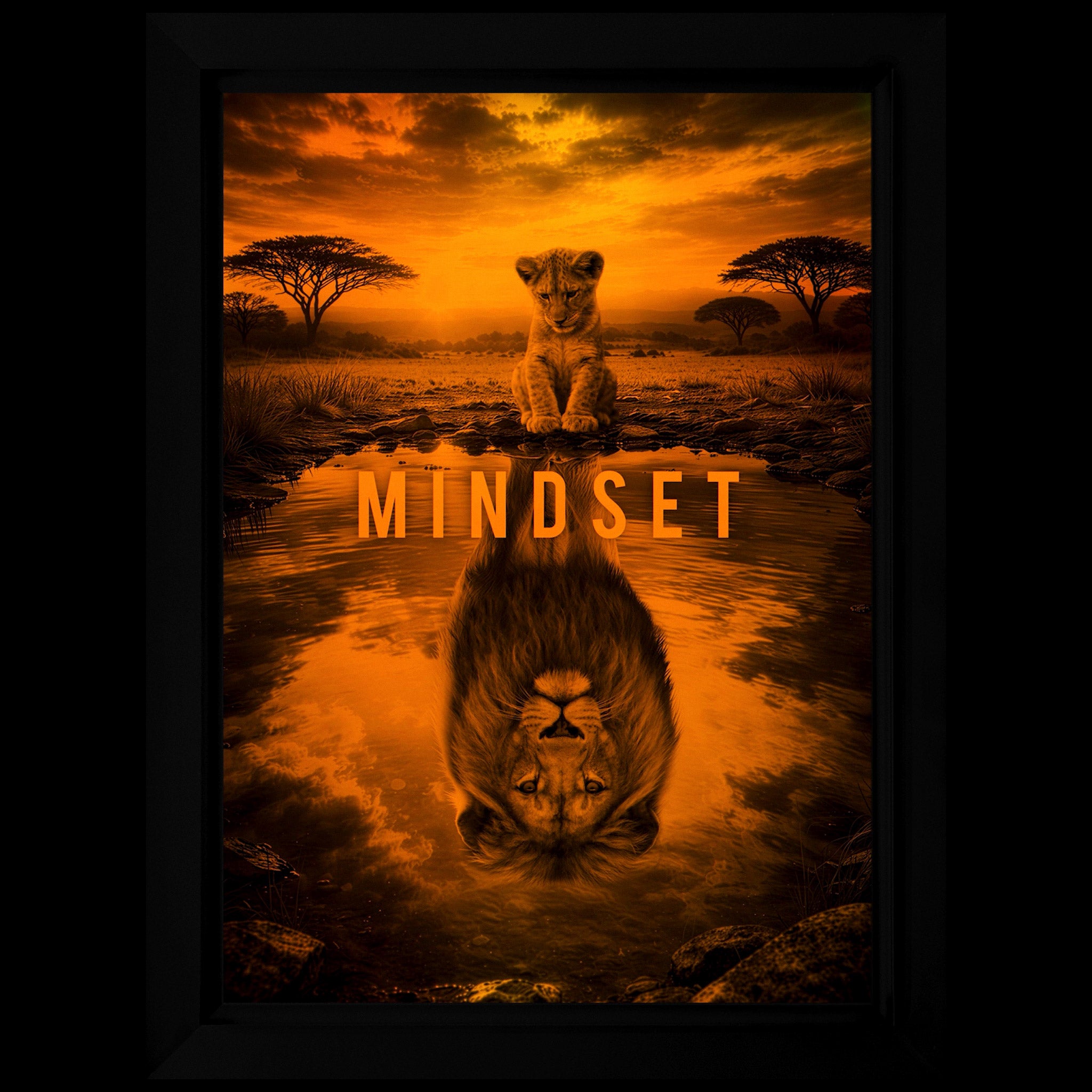 Mindset LED-billede med en løveunge og dens spejlbillede som voksen løve, oplyst i orange og gult lys